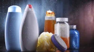 Different containers of body care products in the bathroom