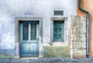 Slowly aging house front in the historic old town of the city of Schaffhausen