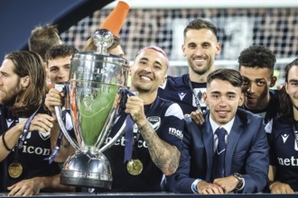 MELBOURNE, AUSTRALIA, FEBRUARY 05: Melbourne Victory and Jason Davidson celebrate winning after the