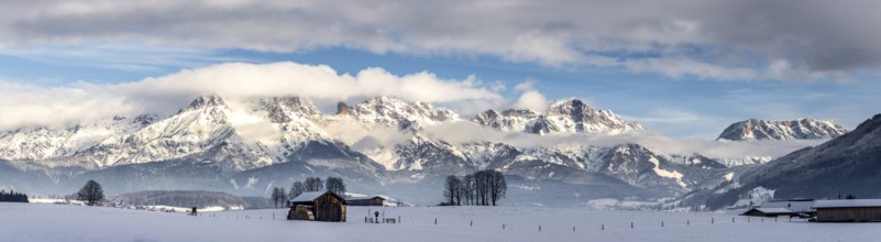 Snowy mountains, meadow and a hut, landscape in Austria, panorama