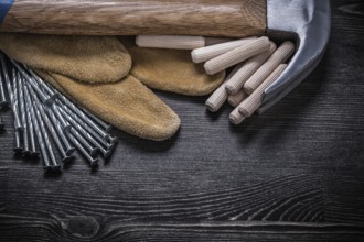 Protective gloves construction nails claw hammer wooden dowels