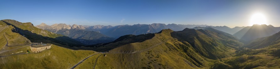 Morning atmosphere, aerial view, panorama at Colle Basset with Assietta ridge road, Sauze d'Oulx,