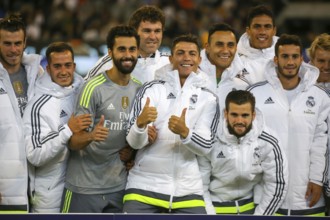 MELBOURNE, AUSTRALIA, JULY 24: Cristiano Ronaldo and team mates celebrate winning the 2015