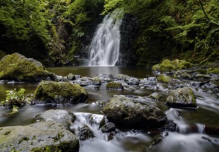 A view of the picturesque Gleno Waterfall in the Glens of Antrim near Larne