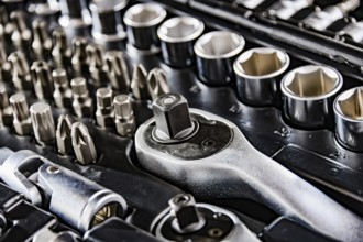 Composition with a variety of metal tools