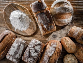 Composition with assorted bakery products on wooden table