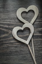 White wooden hearts on wood board celebrations concept