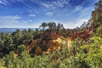 Picturesque pit of production of ochre - natural paint. Roussillon, Red village of Provence