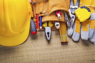 Set of construction tools in toolbelt