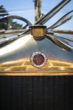 Lisbon, Portugal - Sep 29, 2024: Close-up of Minerva logo grille badge with Roman goddess profile