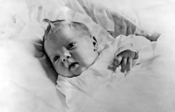 Queen Margrethe II of Denmark. In the picture she is four weeks old and the picture was taken in