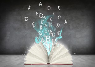 Open book with blue smoke lying in the gray room