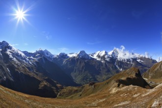 Austrian Alps. Great highway winds between hillsides yellowed. Excursion to the picturesque