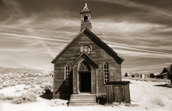 This small chapel made of weather-beaten boards stands on the edge of a dusty road in Bodie. Photo
