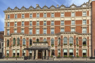 Street in Dublin city center, Ireland. Building of Shelbourne hotel