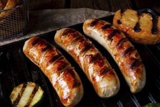 Delicious grilled sausage with various grilled vegetables