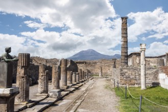 POMPEII, ITALY, MAY 04, 2022, Colonnade and sculptures of the Temple of Apollo near the Pompeian