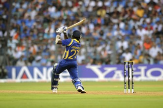 Sri Lankan batsman Mahela Jaywerdena plays shot ICC Cricket World Cup finals Wankhede stadium