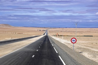 Drive to Essaouira, Morocco, Africa, endless road in a desert landscape with 100 km/h road signs