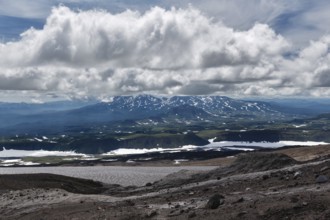 Beautiful mountain (volcanic) cloudy landscape of Kamchatka Peninsula. Asia, Russian Far East