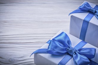 Set of present boxes on wooden board celebrations concept