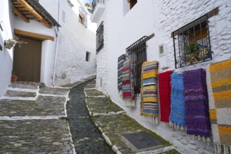 Alpujarras street rugs in Pampaneira of Granada colorful serape