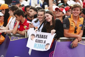 MELBOURNE, AUSTRALIA - MARCH 13: Fans wait for drivers to arrive before the 2025 Australian Grand