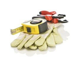 Pliers and tapeline on gloves