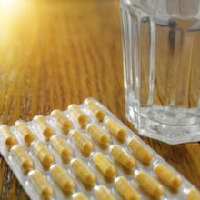 An image of some yellow pills in a blister pack