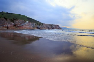 Low tide in the Atlantic. Playa Zumaya. Flysch - unique landscape of underwater rocks exposed at
