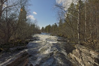 Nellim log flume in spring with clouds in the sky, Nellim, Inari, Lapland, Finland, Europe