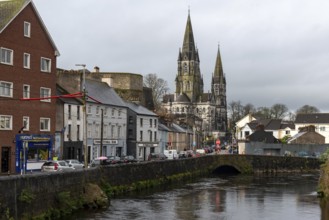 Cork, Ireland, February 25 2023: Urban cityscape of cork city river lee and Fin barre cathedral in