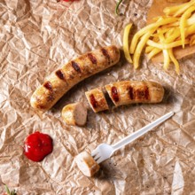 Rustic bratwurst with pommes and hot ketchup