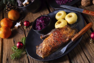 Classic and crispy roast duck with cabbage and dumplings