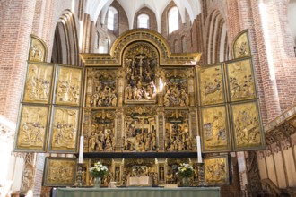 Altar of Roskilde Cathedral in Denmark in sunlight, Roskilde, Denmark, Europe