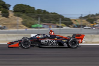 SANTINO FERRUCCI (14) of Woodbury, Connecticut practices for the Firestone Grand Prix of Monterey