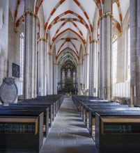The Divi Blasii Church is a three-nave, cruciform hall church on the Untermarkt square in the town