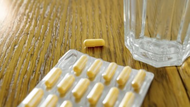 An image of some yellow pills in a blister pack