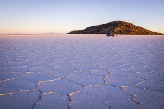 Salar Uyuni, BOLIVIA in September 2015: The sun rises over worlds largest salt lake Salar de Uyuni.