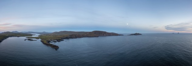Panorama drone view of the Iveragh Peninsula with Valentia Island and Portmagee at sunset