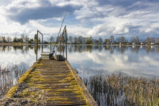 Old jetty with fishing equipment