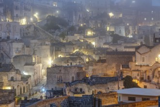 The old town centre of Matera in Italy on a foggy night