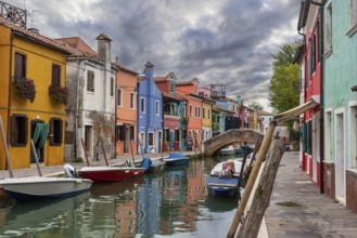 Colorful Houses in Burano beneath a scenic sky, Island of Venice, Italy, Europe