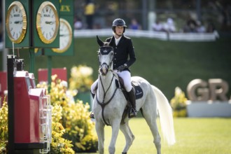 Martin Fuchs of Switzerland and riding Leone Jei compete in the first round of the 1.60m CPKC