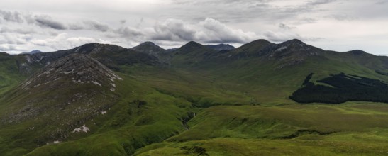 Panorama landscape view of the Twelve Bens mountains in Connemara National Park in County Galway of