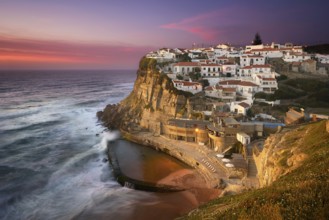 Azenhas do Mar traditional picturesque village in Portugal at sunset
