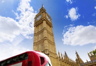 Big Ben Clock tower and London Bus in UK Thames river