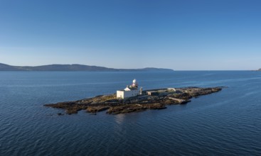 Aerial view of the Roancarrigmore Island Lighthouse in Bantry Bay in County Cork