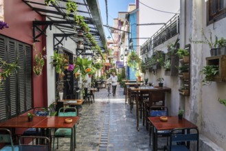 Alley with tourist restaurants and bars in siem reap old town cambodia