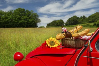 Typical French car with bread and wine for picnic